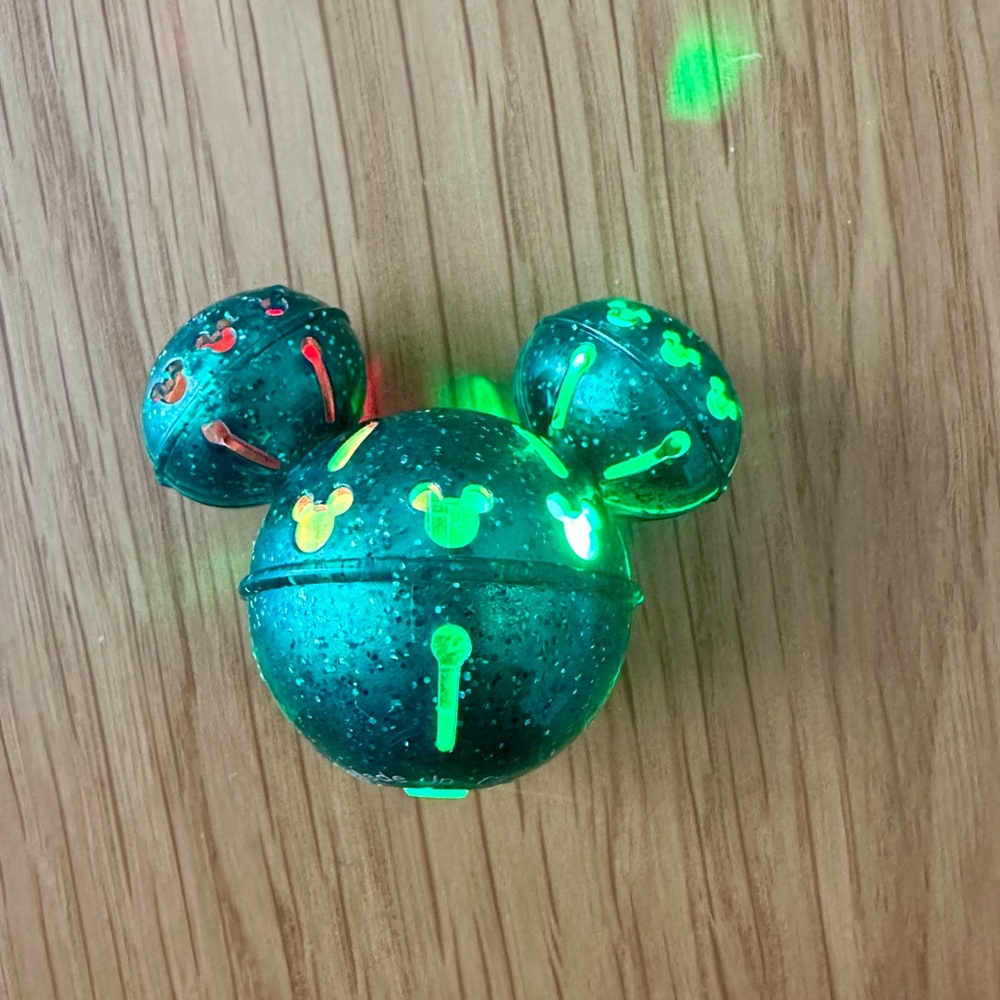 Disneyland Green Holiday Mickey Mouse Shaped Glitter Jingle Bell Glow Cube 2023
